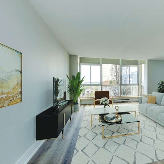 a living room with a blue couch and a coffee table.