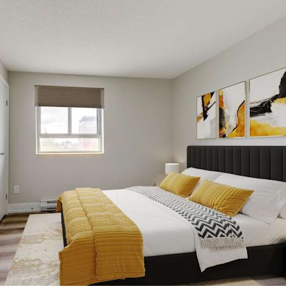 a bedroom with a bed, yellow pillows, and a window.