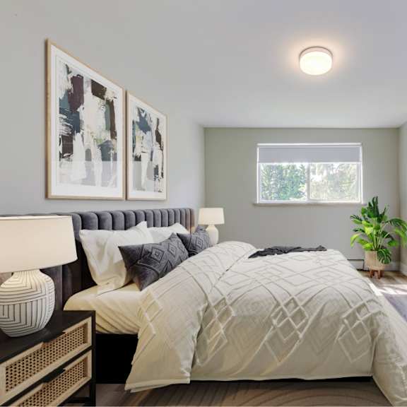 a bedroom with a large bed and a mirror on the wall.