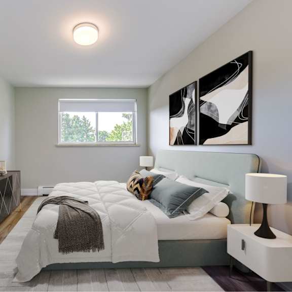 a bedroom with a large bed and a window.