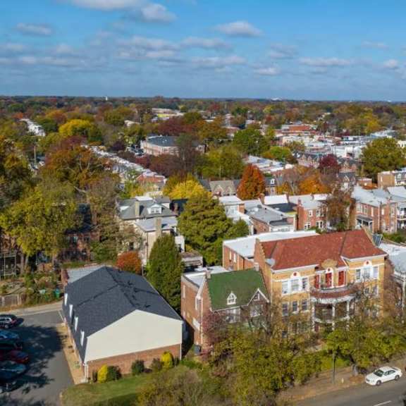 a small town with a mix of residential and commercial buildings.