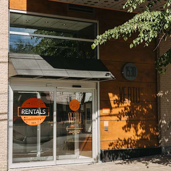 a storefront with a sign that says