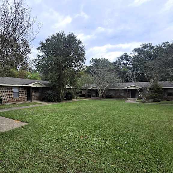a residential area with houses and trees.