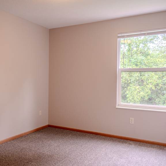 empty room with a window on the right side.