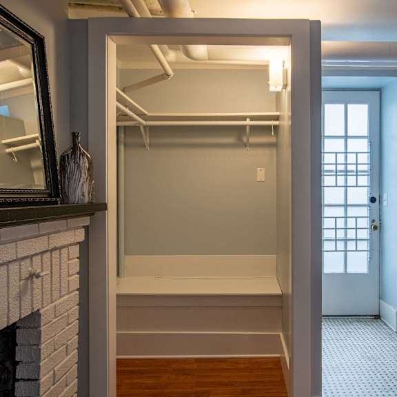 a white door with a window in the background.