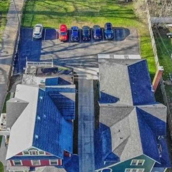 a parking lot with cars parked in it.