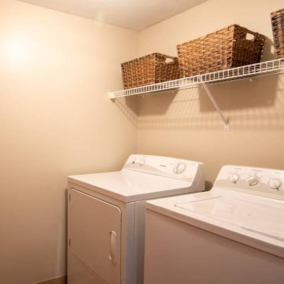 a laundry room with a washer and dryer.