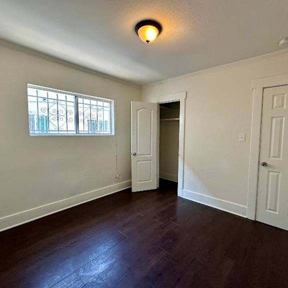 a room with a window and a door.
