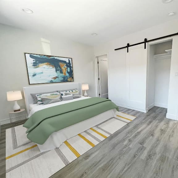 a bedroom with a bed, nightstand, and a painting on the wall.