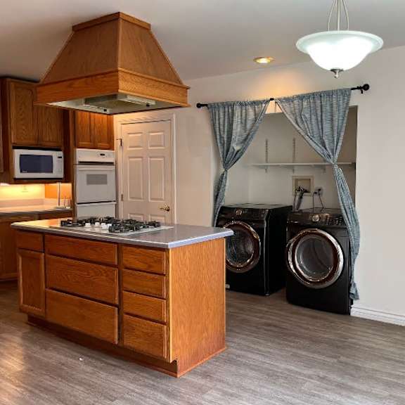 a laundry room with a washer and dryer.