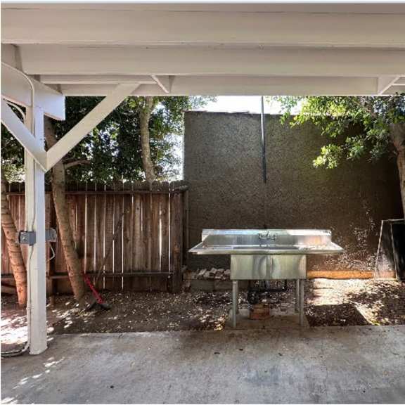 a table is in the middle of a patio.