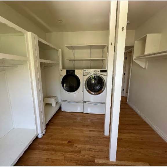 a laundry room with a washer and dryer.