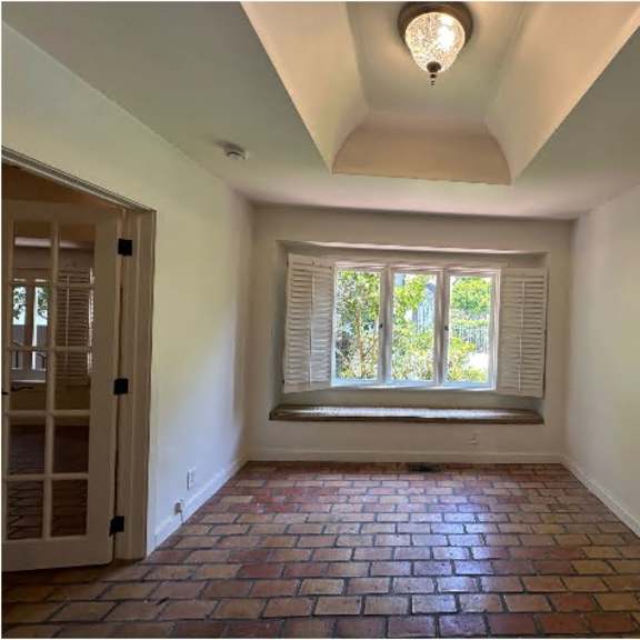 a room with a window and a door.