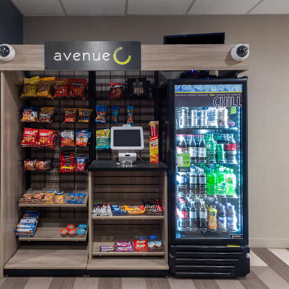 a vending machine with a variety of snacks and drinks.