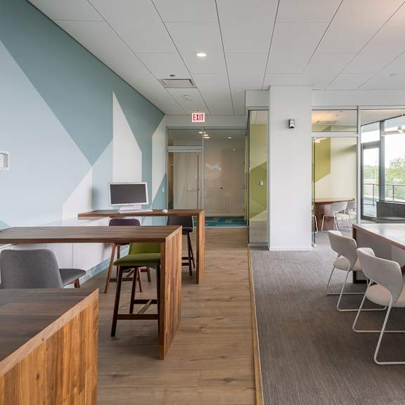 a conference room with a long table and chairs.