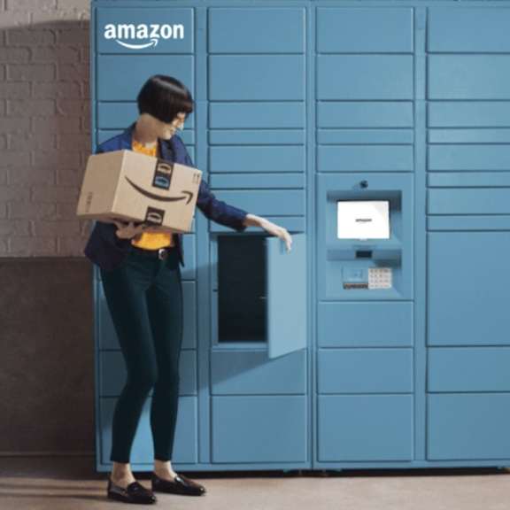a person in a blue uniform is opening a blue amazon locker.