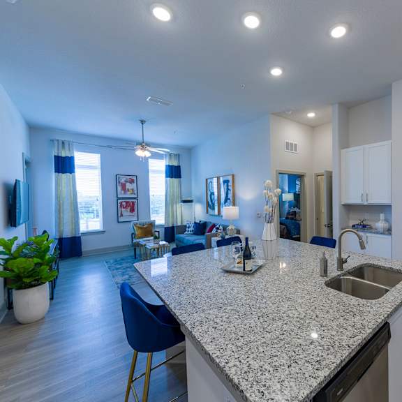 Thumbnail 5 of 9 Open concept apartment with granite island at Ciel Luxury Apartments, Jacksonville, 32246