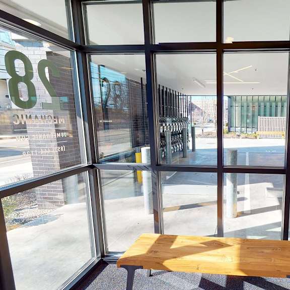 a view from inside a building looking out through a large window.
