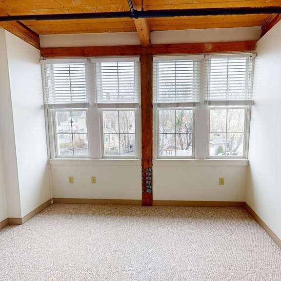 a room with a window and a door.