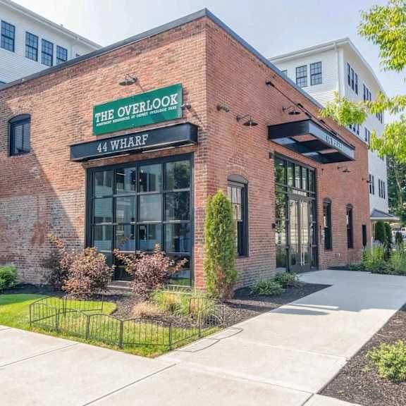the overlook 44 wharf is a modern building with a brick exterior.