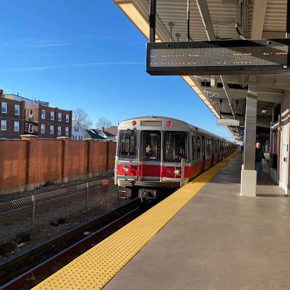 a train is pulling into a station.