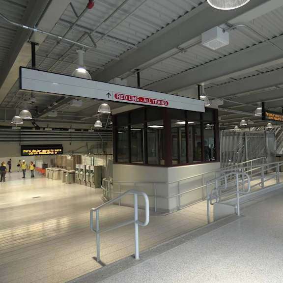 a train station with a red and white sign that says "red line all trains".