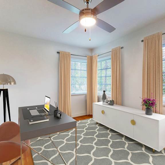 a room with a table, chairs, and a ceiling fan at sunset barrington gardens, los angeles, 90049