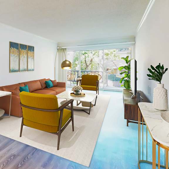 a living room with a yellow couch and a painting of a dog on the wall at casa granada, los angeles, 90049