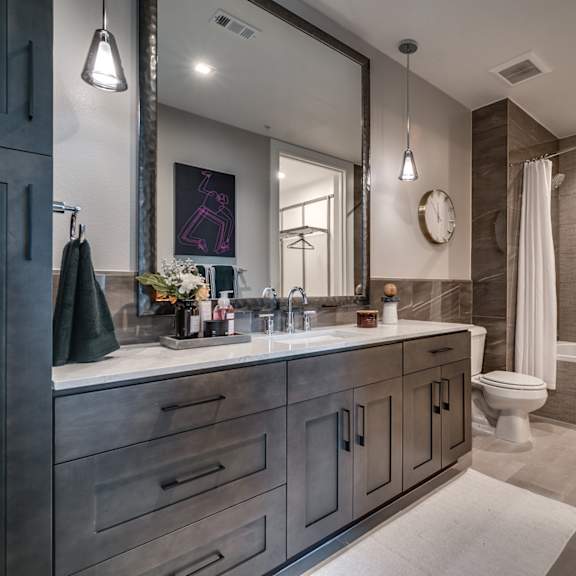designer granite countertops in all bathrooms at the hamilton, texas