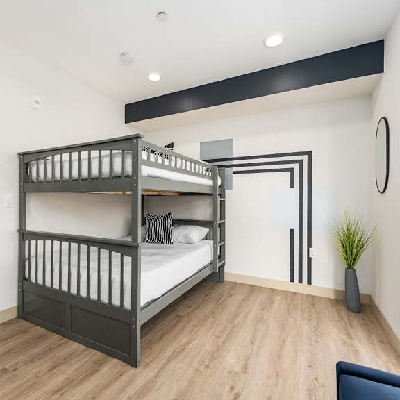 bunk bed room with hardwood floors at lido - 1532 brockton ave apartments, los angeles, 90025