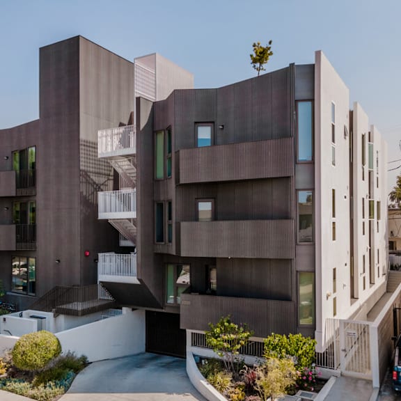 modern apartment building exterior with landscaping at lido - 3714 kelton apartments, los angeles, 90034