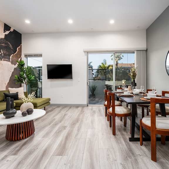 living room with dining area at lido apartments - 4025 grandview, culver city, california