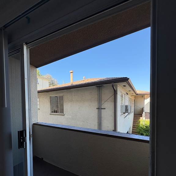 a view of a house through a window.