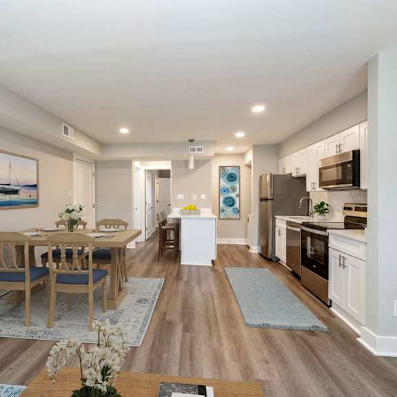 living room and kitchen at the courtyards of chanticleer apartments, virginia