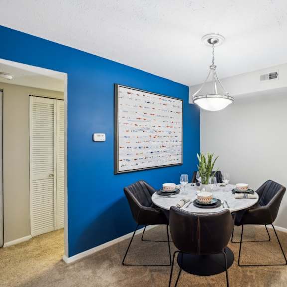 a dining room with a table set for six at chinoe creek apartments, kentucky, 40502