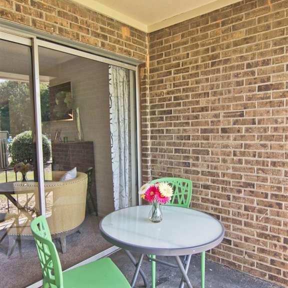 patio view at lakecrest apartments, prg real estate management, south carolina, 29615