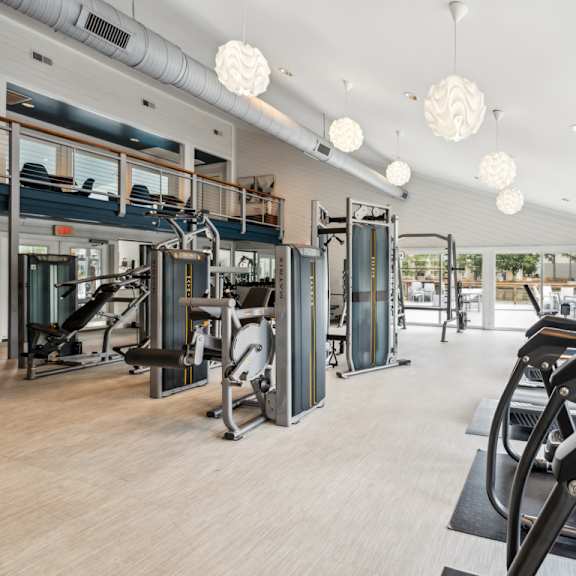 a gym with treadmills, elliptical machines, and other cardio equipment. at linkhorn bay apartments, virginia, 23451