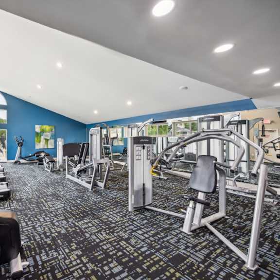 a gym with treadmills, weights, and exercise equipment at chinoe creek apartments, lexington, ky, 40502