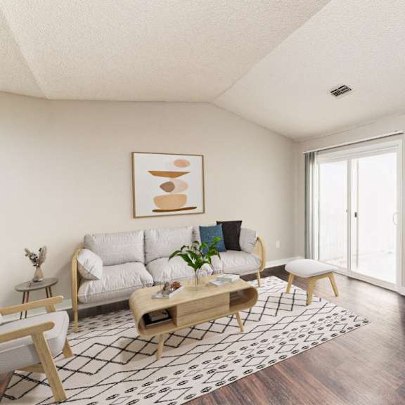 an open living room with a couch and a table at ashton creek, chester, 23831