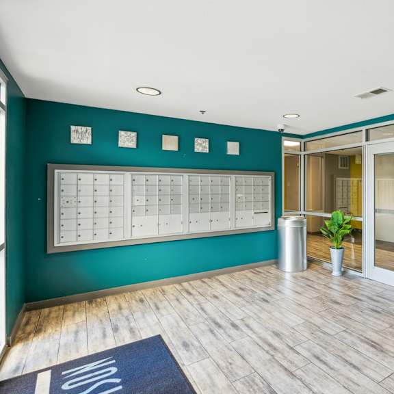room with lockers and a plant in the corner at 45 madison apartments, missouri, 64111