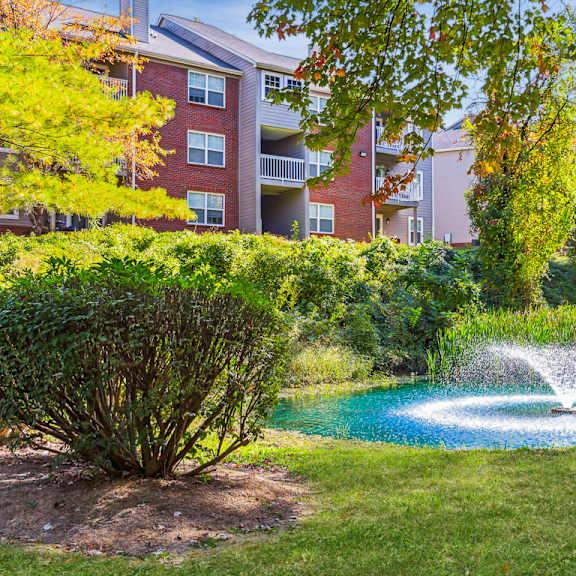fountain in garden at river oak apartments, louisville, 40206