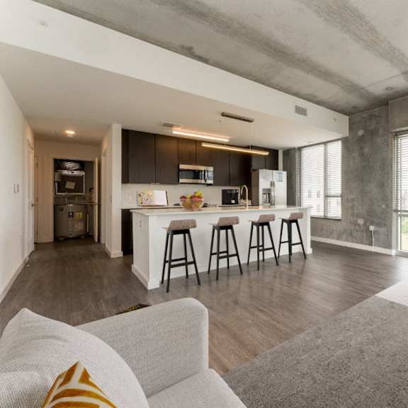 living room with view to the kitchen at south falls tower, richmond, va