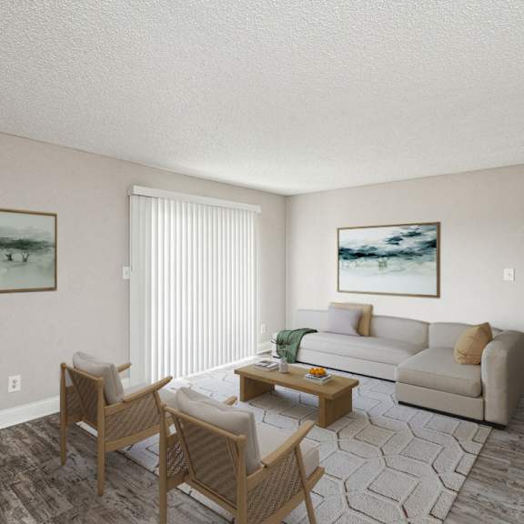 the living room of an apartment with a couch and chairs at the reserve at barry apartments, kansas city, 64154