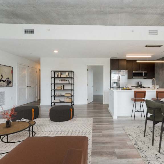 living room with dining area at south falls tower, richmond, va