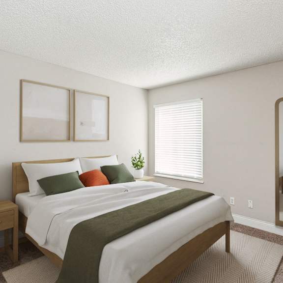 a bedroom with a bed and a mirror at the reserve at barry apartments, kansas city, mo, 64154