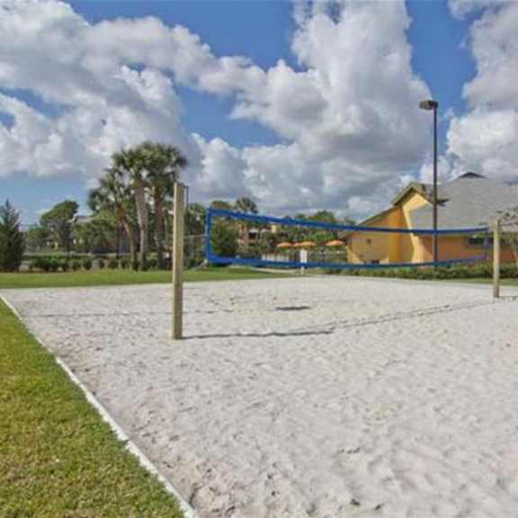 volleyball court at the villages apartment of bayan grove apartments in boynton beach