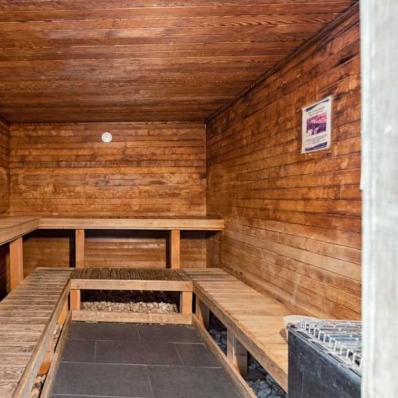 an empty sauna with wooden benches at linkhorn bay apartments, virginia beach