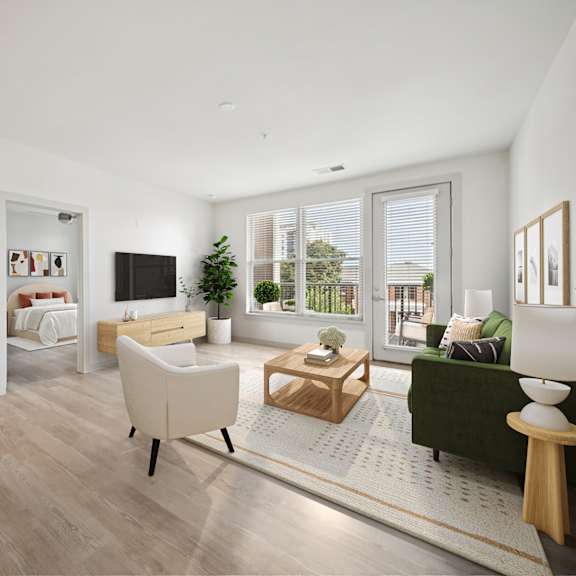 a modern living room with a white sofa and a wooden coffee table at circ apartments, virginia