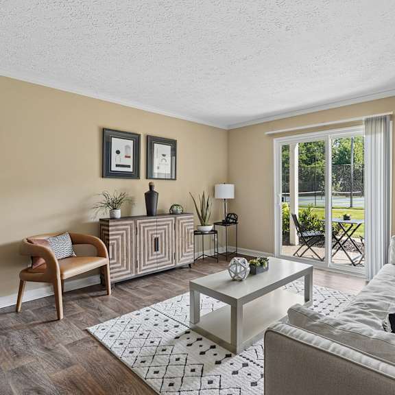living room area at the grove at lyndon apartments louisville, ky