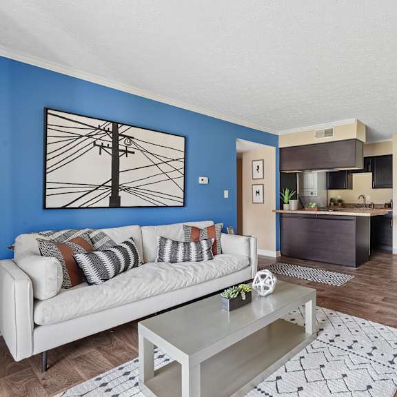 living room at the grove at lyndon apartments in louisville ky